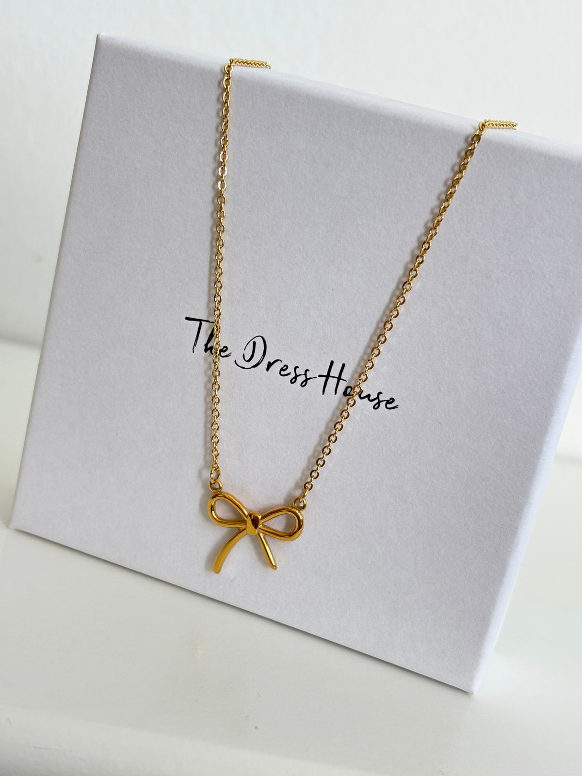Betty - Gold Bow Necklace